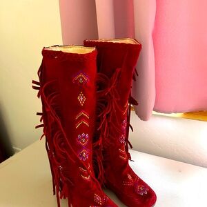 Tall leather boots. Red leather. Never been worn. With fringe and real beads.